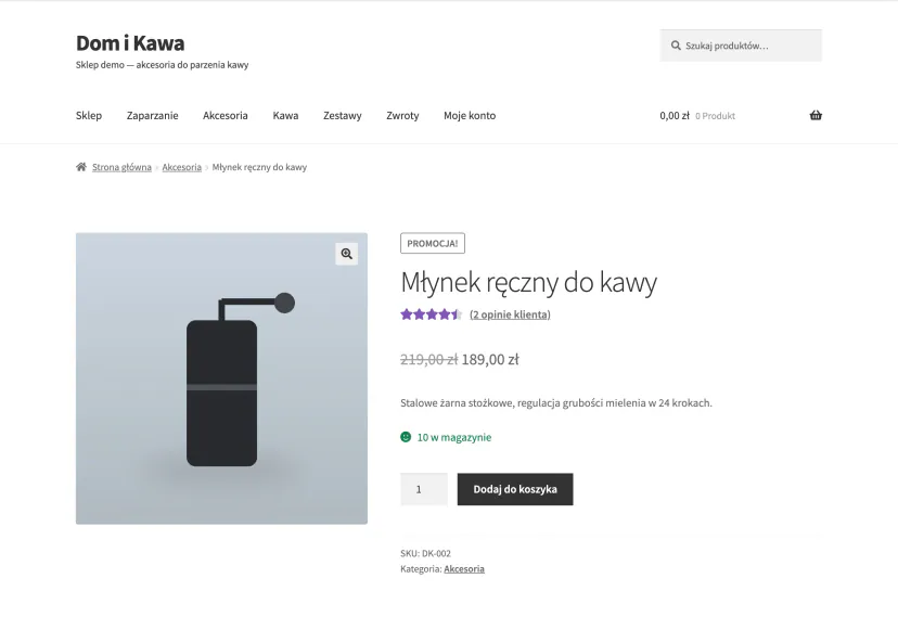 Product page for the “Młynek ręczny do kawy” in a WooCommerce demo store with price, description and the “Add to basket” button